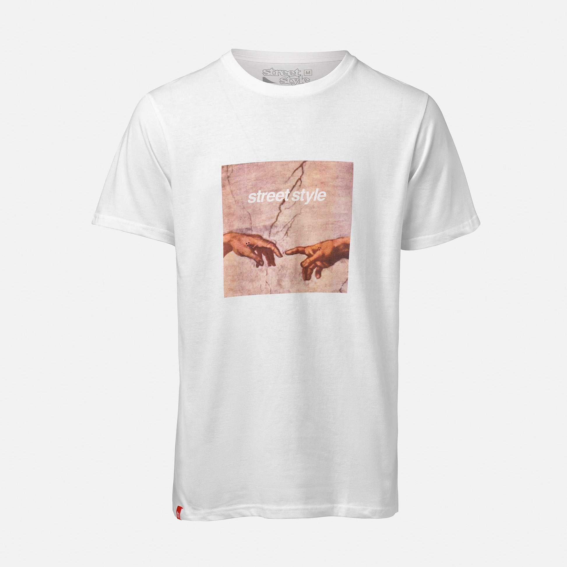 A white T-shirt featuring a graphic of two hands almost touching, inspired by Michelangelo's "The Creation of Adam." The text "street style" is printed above the hands.